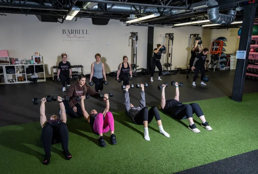 Small-group boot camp session at Barbell Boutique